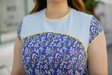 Load image into Gallery viewer, close up of plus size blue floral modern cheongsam qipao inspired shift dress with yellow piping
