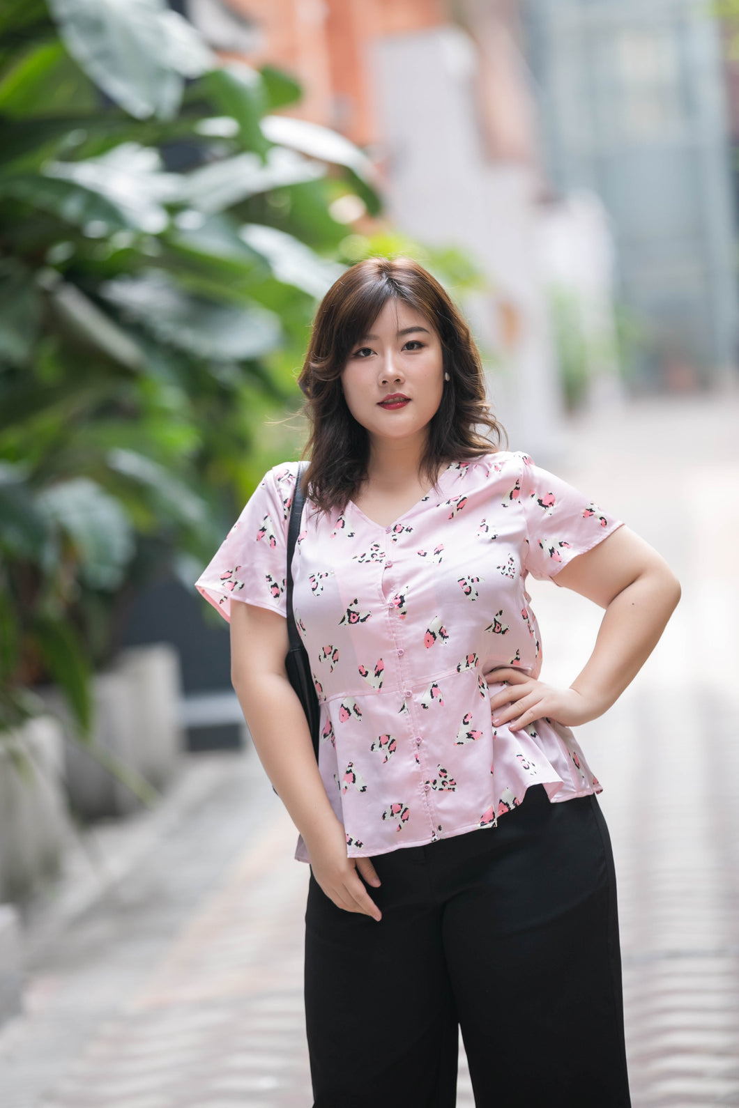 plus size pink heart print satin v neck top with peplum