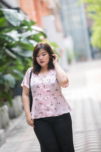plus size pink heart print satin v neck top with peplum