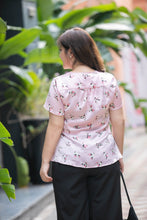 Load image into Gallery viewer, back view of plus size pink heart print satin v neck top with peplum
