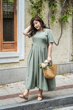 Load image into Gallery viewer, plus size green maxi dress with side ties 
