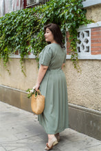 Load image into Gallery viewer, back view of plus size green maxi dress with side ties 
