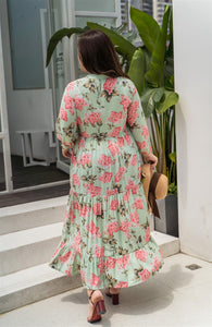 back view of plus size green and pink floral maxi dress