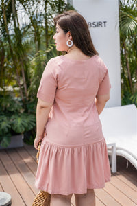 back view of plus size pink drop waist dress
