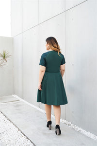 Plus Size Emerald Green Cocktail Dress with Jacquard Sleeves and Inverted Pleats Back View