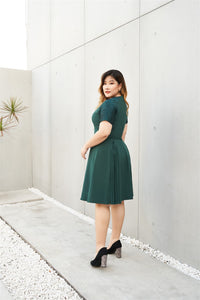 Plus Size Emerald Green Cocktail Dress with Jacquard Sleeves and Inverted Pleats side view