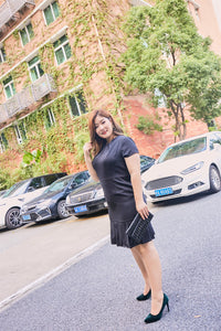 Plus size black mermaid tail dress with pleated v-neck