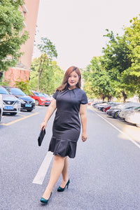 Plus size black mermaid tail dress with pleated v-neck